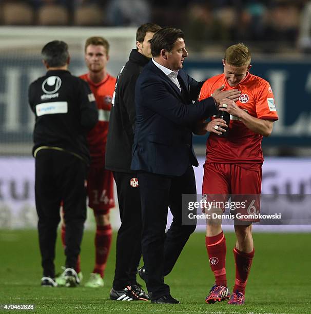 Head coach Kosta Runjaic of 1. FC Kaiserslautern hugs Alexander Ring after the Second Bundesliga match between 1. FC Kaiserslautern and RB Leipzig at...