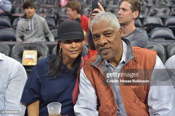 Dorys Madden and husband former NBA player Julius Erving attends the Brooklyn Nets vs. Atlanta Hawks playoff game 1 at Philips Arena on April 19,...