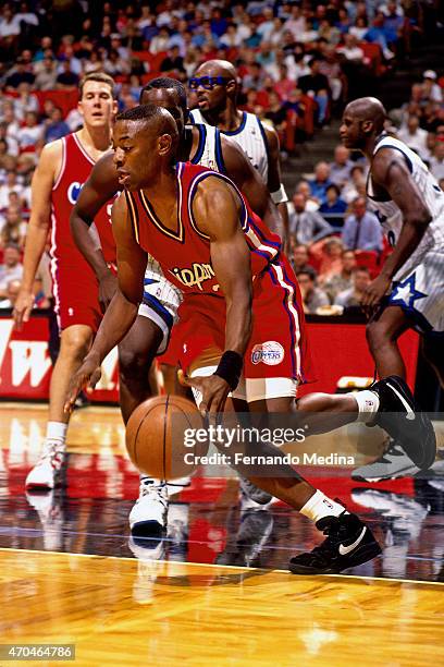 Keith Smart of the Los Angeles Clippers dribbles against the Orlando Magic on October 10, 1994 at the Amway Arena in Orlando, Florida. NOTE TO USER:...