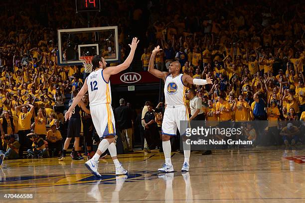 Leandro Barbosa and Andrew Bogut of the Golden State Warriors celebrate during a game against the New Orleans Pelicans and in Game One of the Western...