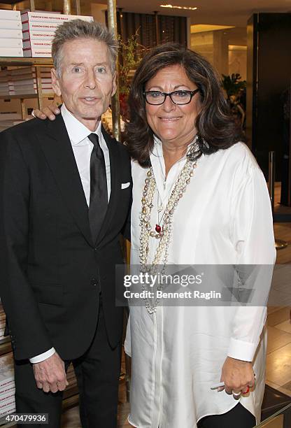 Designer Calvin Klein and Fern Mallis attend Fashion Lives Book Launch at Saks Fifth Avenue on April 20, 2015 in New York City.