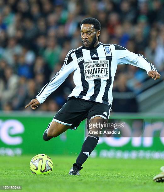 Jay-Jay Okocha in action during the Match Against Poverty at Stade Geoffroy-Guichard on April 20, 2015 in Saint-Etienne, France. The 12th annual...