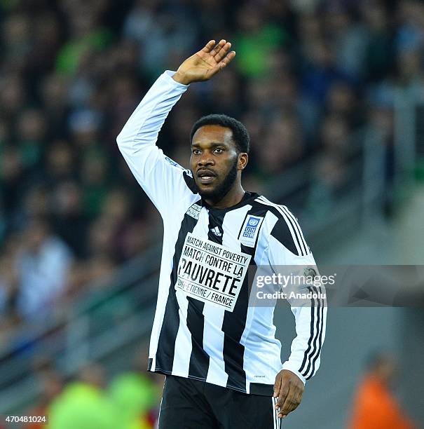 Jay-Jay Okocha in action during the Match Against Poverty at Stade Geoffroy-Guichard on April 20, 2015 in Saint-Etienne, France. The 12th annual...