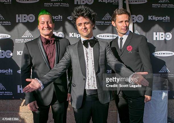 Musicians Tre Cool, Billie Joe Armstrong and Mike Dirnt of Green Day attend the 30th Annual Rock And Roll Hall Of Fame Induction Ceremony at Public...
