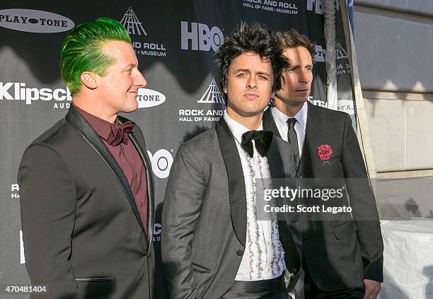 Musicians Tre Cool, Billie Joe Armstrong and Mike Dirnt of Green Day attend the 30th Annual Rock And Roll Hall Of Fame Induction Ceremony at Public...