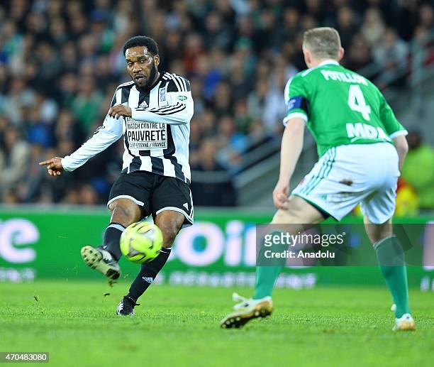 Jay-Jay Okocha in action during the Match Against Poverty at Stade Geoffroy-Guichard on April 20, 2015 in Saint-Etienne, France. The 12th annual...