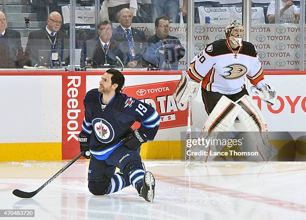 Jim Slater of the Winnipeg Jets and Goaltender Jason LaBarbera of the Anaheim Ducks take part in the pre-game warm up prior to Game Three of the...