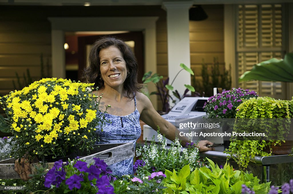 Female owner / worker at nursery/ florist