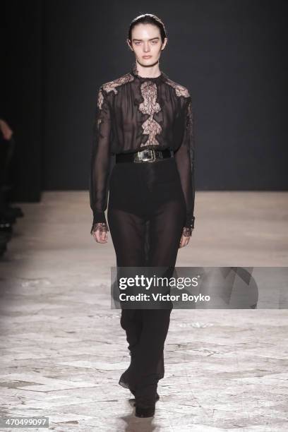 Model walks the runway during the Francesco Scognamiglio show as a part of Milan Fashion Week Womenswear Autumn/Winter 2014 on February 19, 2014 in...