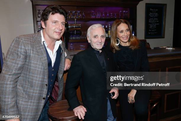 Philippe Lellouche, Charles Aznavour and Marisa Berenson pose after the "L'appel de Londres" theatrical premiere at Theatre Du Gymnase on February...