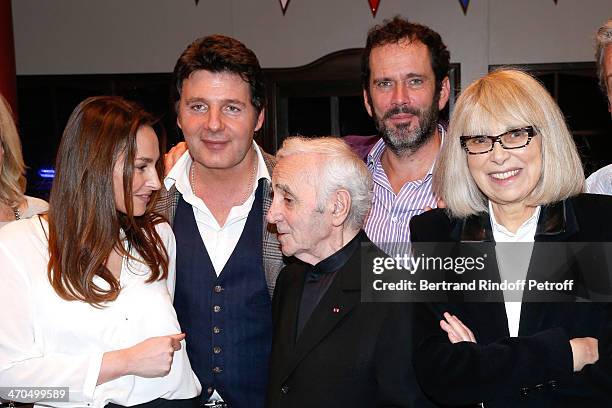 Vanessa Demouy and her husband Philippe Lellouche, Charles Aznavour, Christian Vadim and Mireille Darc pose after the "L'appel de Londres" theatrical...