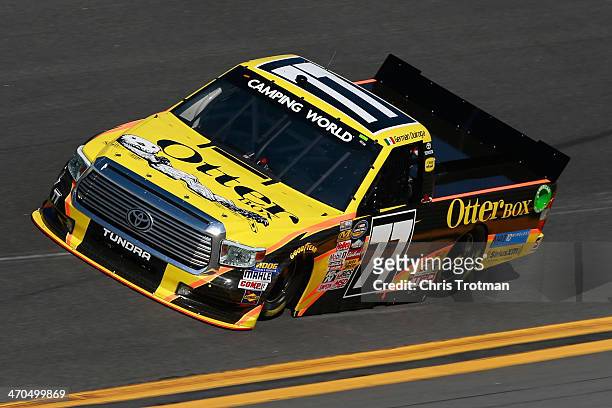 German Quiroga, driver of the OtterBox Toyota, practices for the NASCAR Camping World Truck Series NextEra Energy Resources 250 at Daytona...