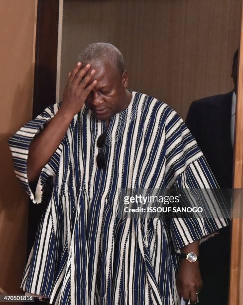 Chairman of the Economic Community Of West African States and president of Ghana, John Dramani Mahama, gestures as he arrives for a meeting with...