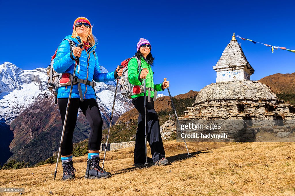 Two young women trekking in Himalayas, Mount Everest National Park