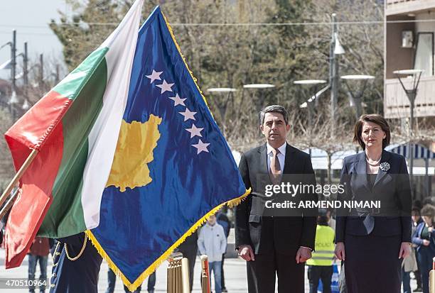 Kosovo President Atifete Jahjaga and her Bulgarian counterpart Rosen Plevneliev review the Kosovo's Security Force honor guard in Pristina on April...