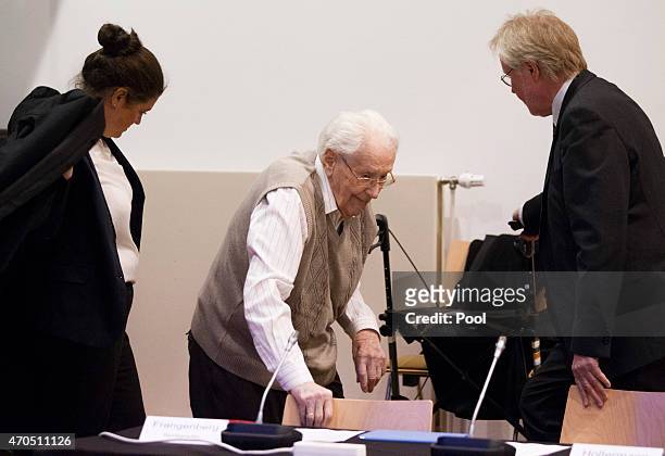 Oskar Groening arrives for the first day of his trial to face charges of being accomplice to the murder of 300,000 people at the Auschwitz...