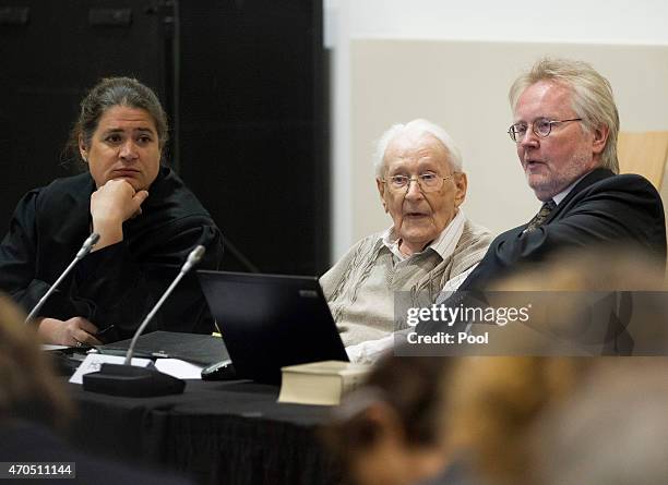 Oskar Groening arrives for the first day of his trial to face charges of being accomplice to the murder of 300,000 people at the Auschwitz...