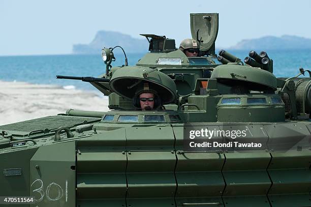 Marines amphibious assualt vehicles take part in manoeuvres during the Balikatan war games exercise in San Antonio town on April 21, 2015 in Zambales...