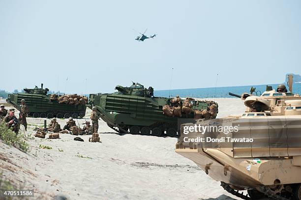 Marines amphibious assualt vehicles take part in manoeuvres during the Balikatan war games exercise in San Antonio town on April 21, 2015 in Zambales...