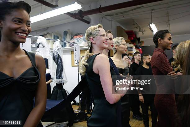Melodie Monrose, Anne Vyalitsyna, Anne Cleveland, Soo Joo Park and Arlenis Sosa wait backstage at the Zac Posen Fall 2014 Collection during...