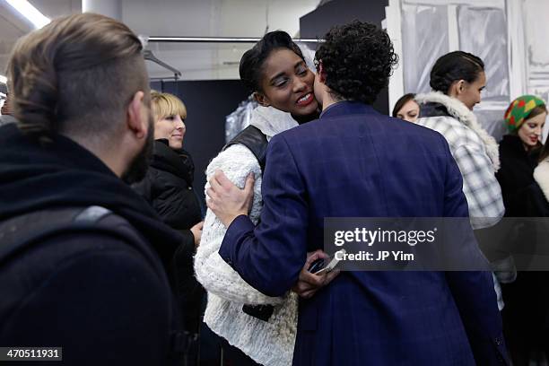 Model Melodie Monrose and designer Zac Posen celebrate at the conclusion of the Zac Posen Fall 2014 Collection during Mercedes-Benz Fashion Week Fall...