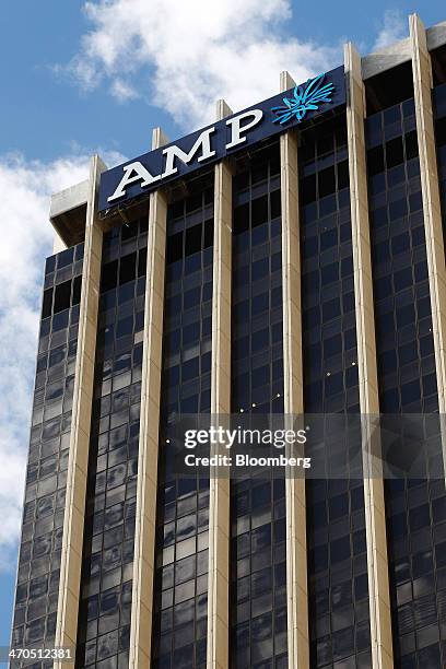 The logo of AMP Ltd. Is displayed atop the company's headquarters in Sydney, Australia, on Thursday, Feb. 20, 2014. AMP, Australias largest life...