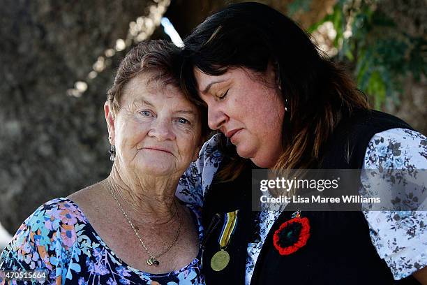 Rose Hawkins and daughter Joanne Connop attend a wreath laying ceremony and receive a Australian flag in honor of their relative Private Reginald...