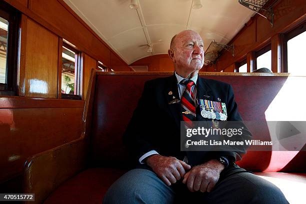 Veteran John Moffitt who served in the forces for 21 years sits aboard the ANZAC Troop Train on April 21, 2015 in Longreach, Australia. The 2015...