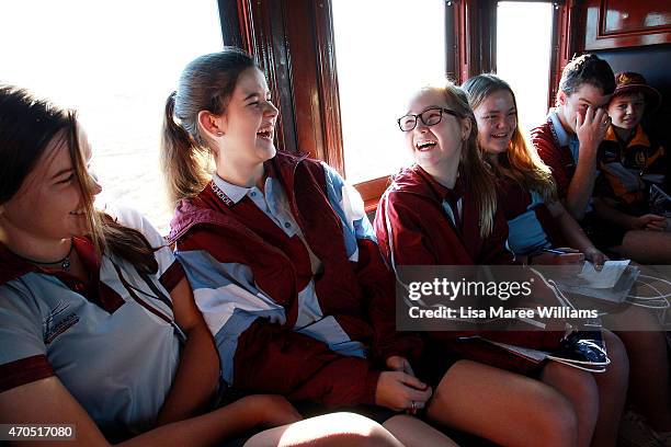 Longreach State High School students ride the ANZAC Troop Train from Longreach to Alpha on April 21, 2015 in Longreach, Australia. The 2015 ANZAC...