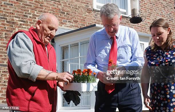 Hilary Benn, the Shadow Communities Secretary and Labour candidate for Redcar Anna Turley talk about gardening with volunteer gardner Harry Slattery...