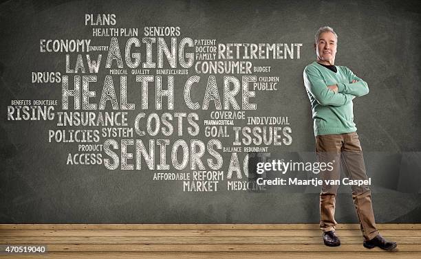 senior man, health care word cloud on blackboard background - word cloud stock pictures, royalty-free photos & images