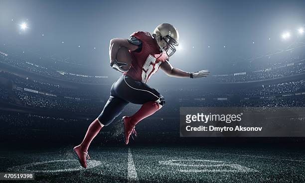 american-football in aktion - verteidiger fußballspieler stock-fotos und bilder