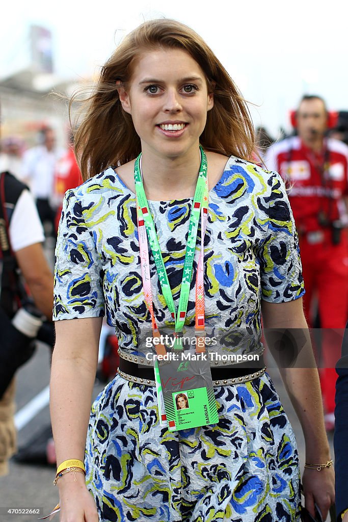 Princess Beatrice walks across the grid during the Bahrain Formula