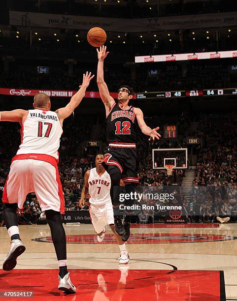 February 19: Kirk Hinrich of the Chicago Bulls takes a shot during a game against the Toronto Raptors on February 19, 2014 at the Air Canada Centre...