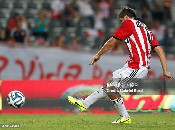 Guido Carrillo of Estudiantes converts a penalty to score his second goal during a match between Estudiantes and Lanus as part of third round of...