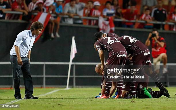 Santiago Silva of Lanus celebrates with teammates a scored goal to tie the match during a match between Estudiantes and Lanus as part of third round...