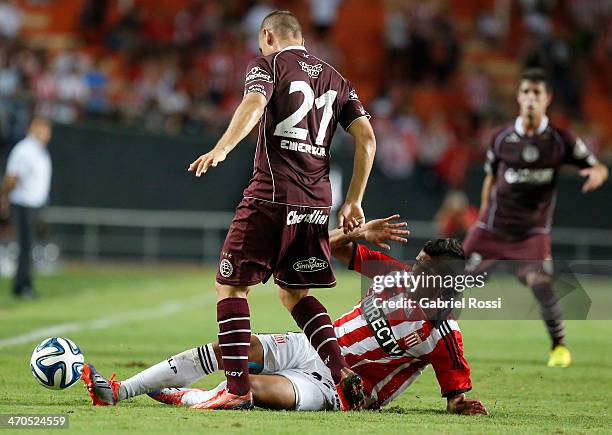 Franco Jara of Estudiantes fights for the ball with Nicolas Pasquini of Lanus during a match between Estudiantes and Lanus as part of third round of...