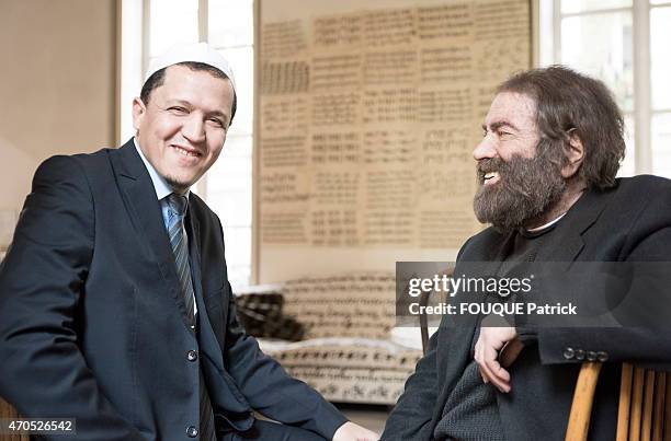 Jewish writer Marek Halter and muslim Hassen Chalghoumi, iman of the mosque of Drancy at Marek Halter's home in Paris on February 11, 2015. The...