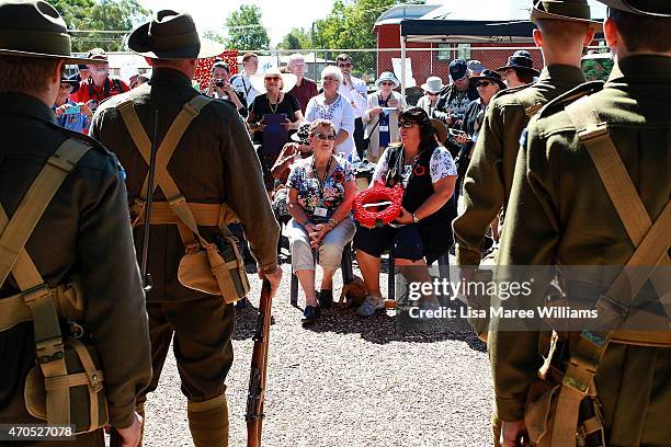 Rose Hawkins and daughter Joanne Connop attend a wreath laying ceremony and receive a Australian flag in honor of their relative Private Reginald...