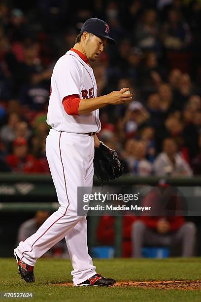 Junichi Tazawa of the Boston Red Sox looks on in between pitches against the Washington Nationals during the eighth inning at Fenway Park on April...