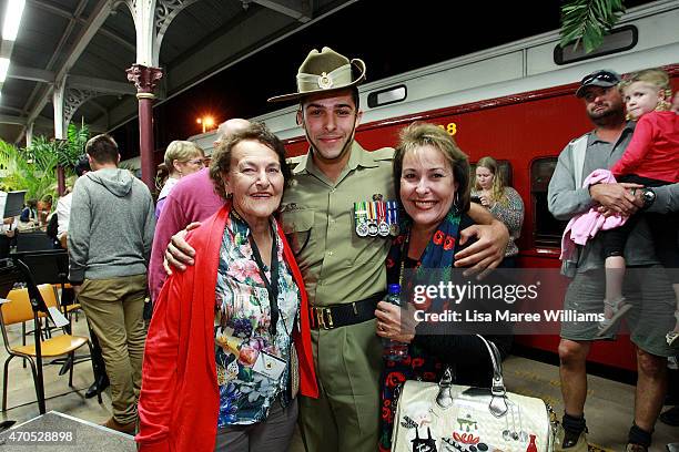 Lance Corporal Ben McDonald of the '2nd Combat Engineer Regiment' who served in Afghanistan in 2012, rides the ANZAC Troop Train with family on April...