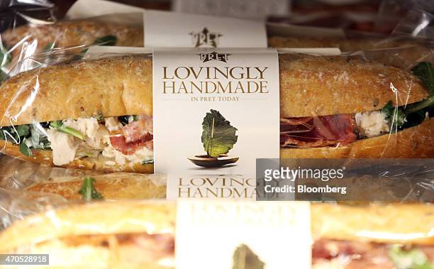 Freshly prepared baguettes sit in a chilled display cabinet inside a Pret A Manger sandwich store, operated by private equity firm Bridgepoint, in...