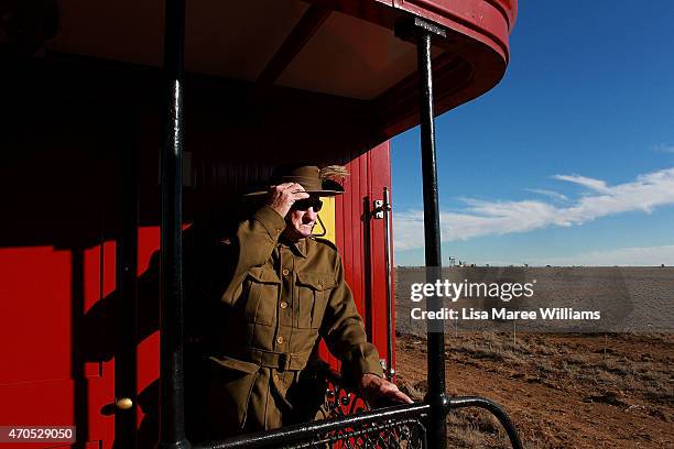 Kevin Bathurst of the '1st Light Horse Regiment' from Rockhampton looks out at the view from the ANZAC Troop Train on April 21, 2015 in Longreach,...