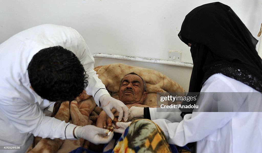 Injured Yemenis receive treatment following Saudi-led air operation in Sana'a