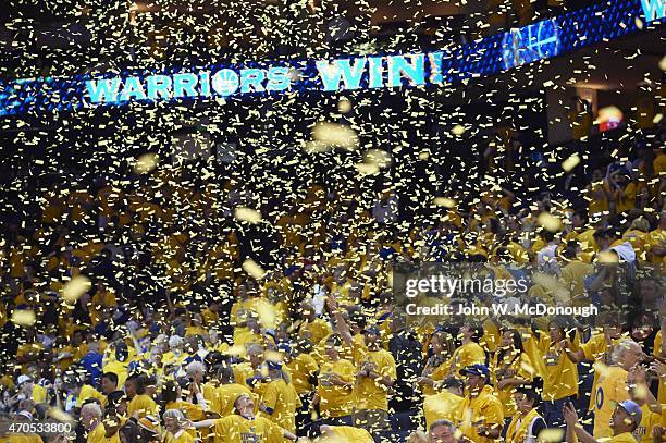 Playoffs: Overall view of Golden State Warriors fans victorious and confetti falling after winning Game 1 vs New Orleans Pelicans at Oracle Arena....