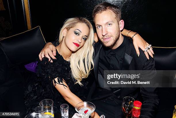 Rita Ora and Calvin Harris attend the Three Six Zero and Nokia MixRadio Party at Hakkasan on February 19, 2014 in London, England.