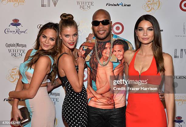 Chrissy Teigen, Nina Agdal, Flo Rida, and Lily Aldridge attend Club SI Swimsuit at LIV Nightclub hosted by Sports Illustrated at Fontainebleau Miami...