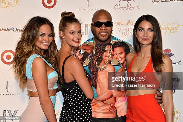 Chrissy Teigen, Nina Agdal, Flo Rida, and Lily Aldridge attend Club SI Swimsuit at LIV Nightclub hosted by Sports Illustrated at Fontainebleau Miami...