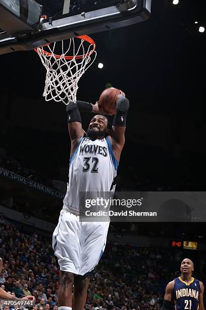 Ronny Turiaf of the Minnesota Timberwolves dunks the ball against the Indiana Pacers during the game on February 19, 2014 at Target Center in...