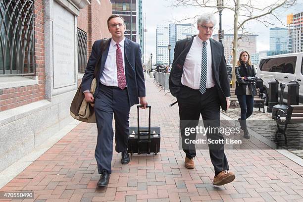 Members of the legal defense team for Boston Marathon bombing suspect Dzhokhar Tsarnaev, including William Fick and Timothy G. Watkins walk away from...